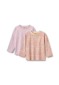 Zwei langärmelige Kinderhemden, eines einfarbig helllila, das andere beige mit einem rosa Herzmuster, beide mit rundem Ausschnitt.
