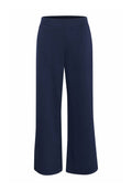 Navyweite Beinhosen aus weichem Stoff, mit einem elastischen Bund und glatter Textur. Keine auffälligen Muster oder Hardware-Details.