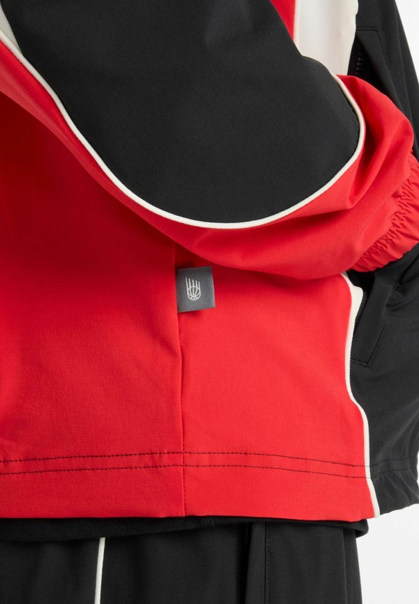 New Balance GAME TRACK JACKET