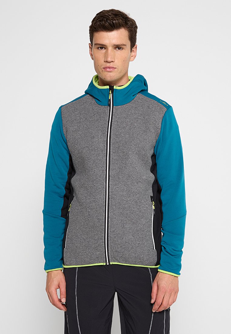 Graue Mid-Layer-Jacke mit türkisfarbenen Ärmeln und schwarzen Seiten. Verfügt über einen Reißverschluss, eine Kapuze und kontrastierende gelbe Akzente entlang der Kanten.