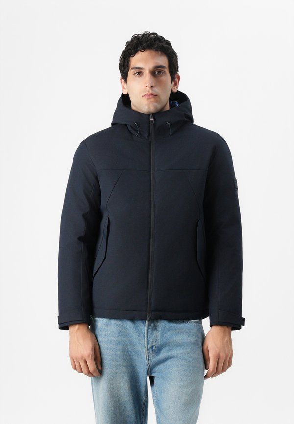 Tommy Hilfiger TECH HOODED SHORT PADDED JACKET - Waterproof jacket - desert sky