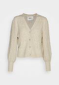Beige Strickjacke mit Rautenmuster, Perlenverzierungen, V-Ausschnitt und geripptem Saum mit Knopfverschluss. Lange gepuffte Ärmel.