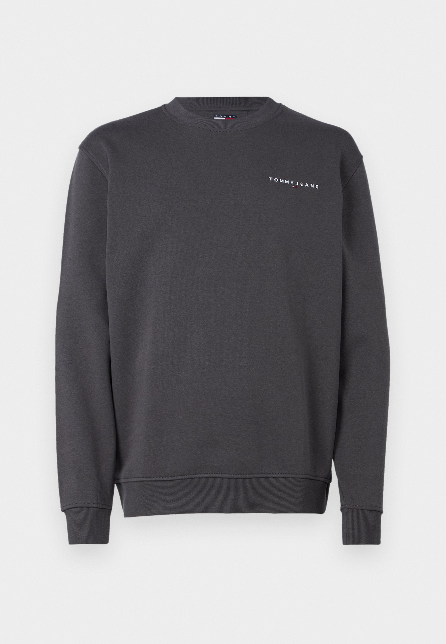 Grauer Pullover aus weichem Baumwollmix, mit Rundhalsausschnitt und gerippten Bündchen. Auf der linken Brust befindet sich ein weißer Logotext.