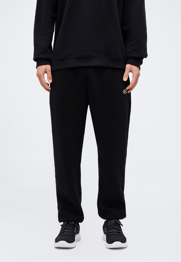 Under Armour RIVAL FLEECE - Tracksuit bottoms - ultimate black/white