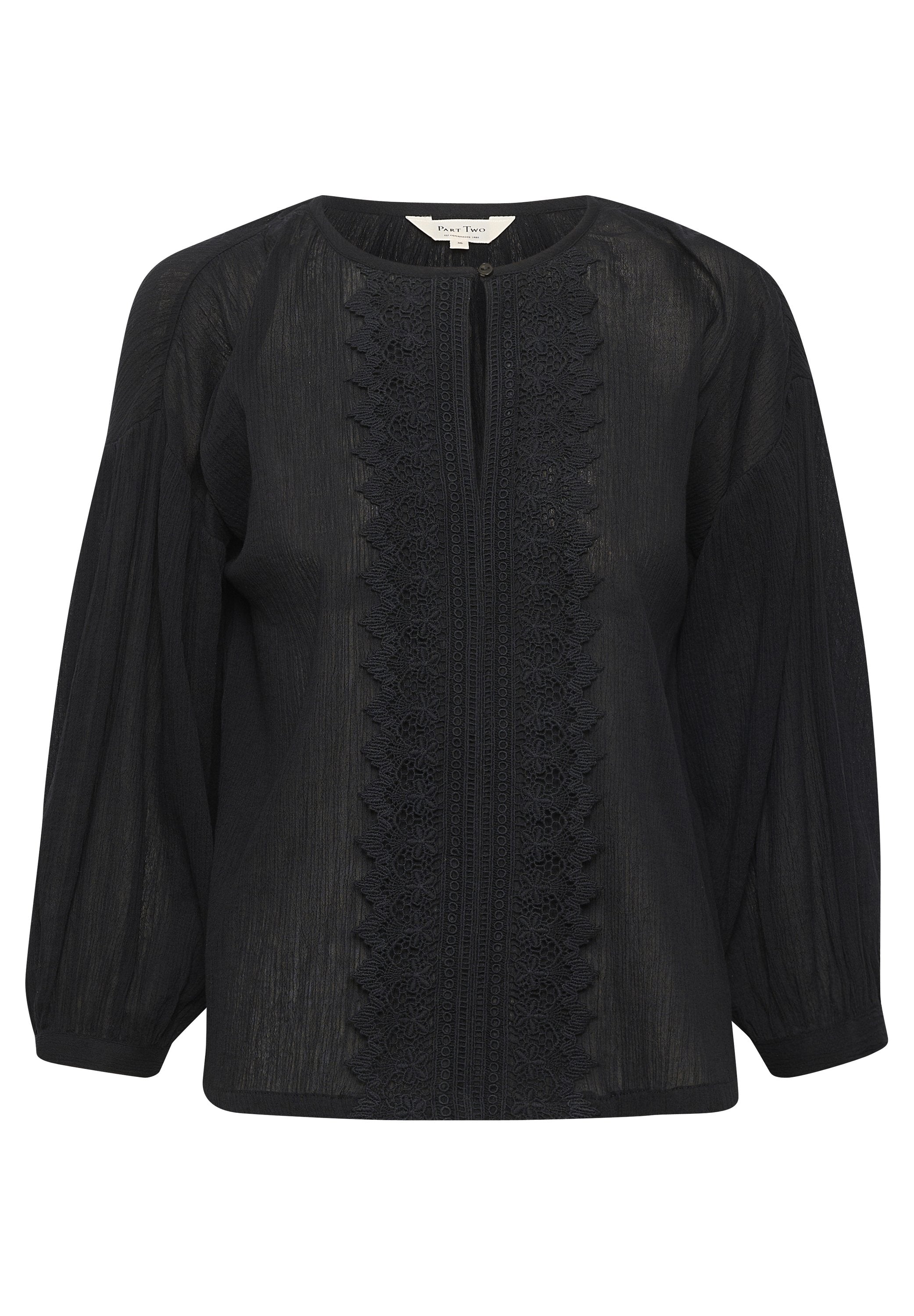 Schwarze Bluse mit Rundhalsausschnitt, aus strukturiertem Stoff, mit Details an der Vorderseite und langen Puffärmeln. Bestickte florale Akzente veredeln das Design.