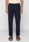 Marineblaue, leichte Hose mit elastischem Bund und türkisfarbenem Kordelzug. Schlanke Passform mit glatter Textur und ohne sichtbare Muster.