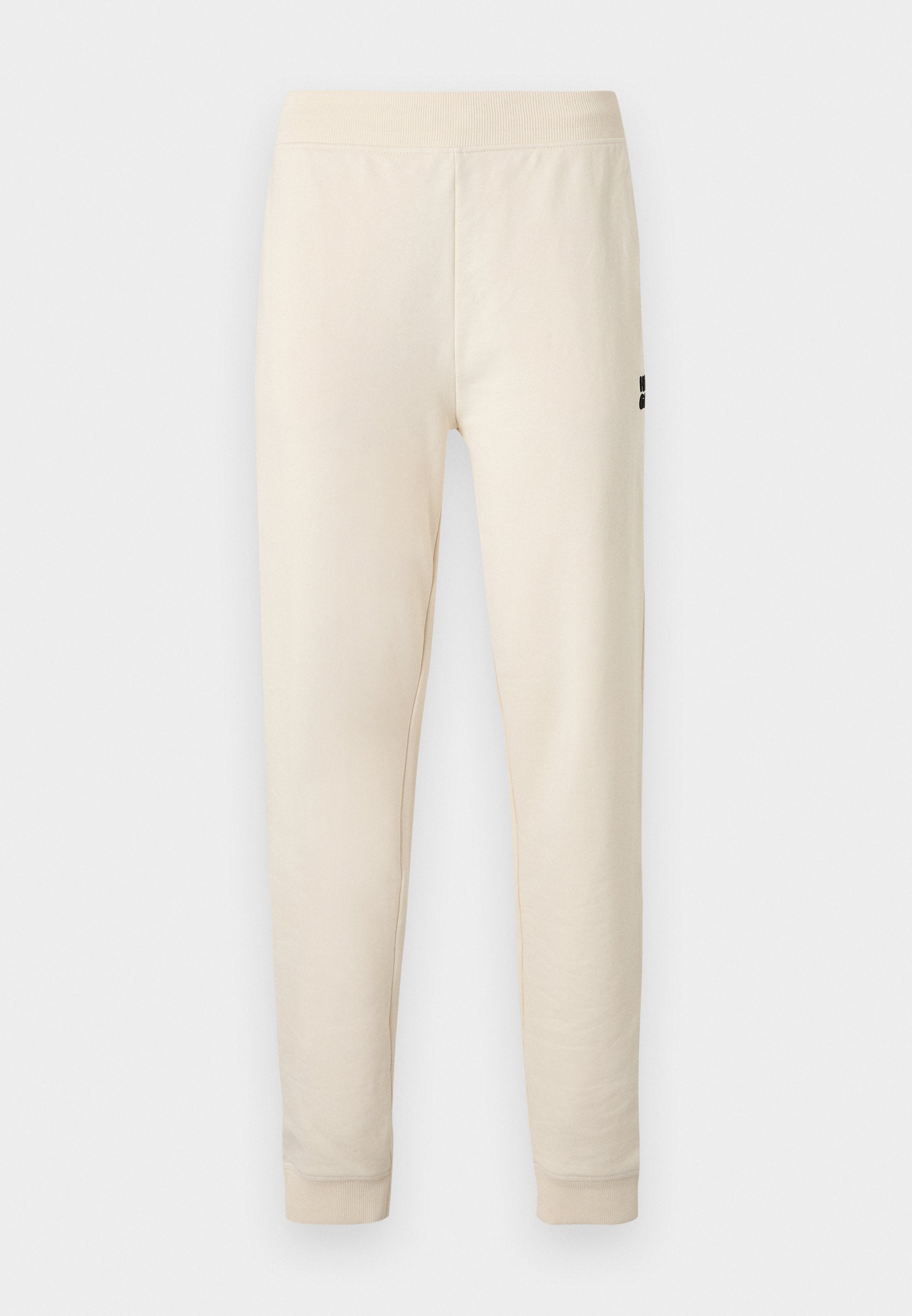 Cremefarbene Slim-Fit-Jogginghose mit elastischem Bund und Bündchen, mit einem kleinen schwarzen Logo am oberen Oberschenkel.