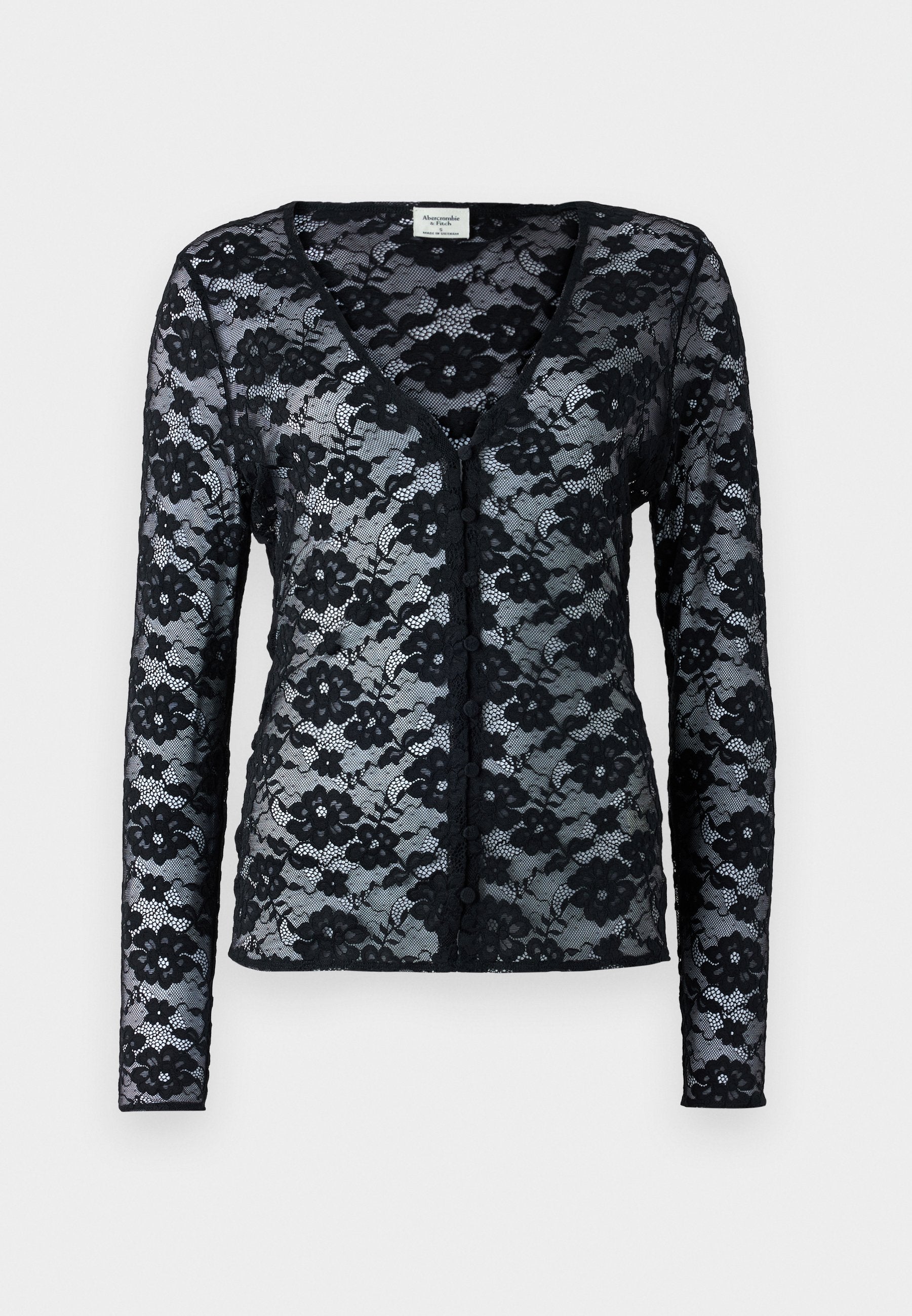 Schwarze Spitzenstrickjacke mit langen Ärmeln, V-Ausschnitt und Blumenmuster. Verfügt über eine Knopfverschluss und eine transparente, zarte Textur.