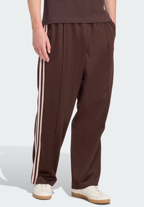 adidas Originals FIREBIRD OVERSIZED FIT UNISEX - Tracksuit bottoms - aurora coffee