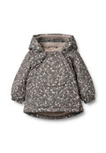 Gesteppte Jacke in Dunkelgrau mit floralem Muster in Pink und Weiß, ausgestattet mit Kapuze, elastischen Bündchen und einer Vordertasche.