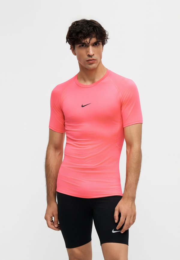Nike Performance TIGHT - Undershirt - pink/black