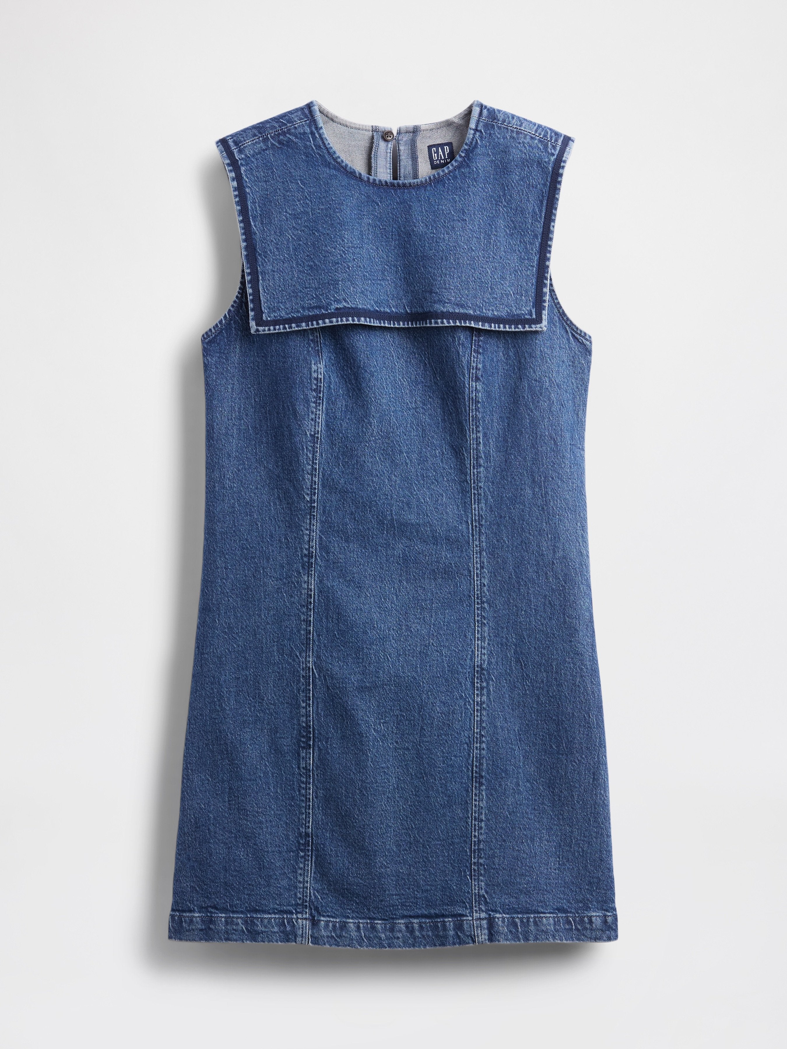 Denimkleid mit ärmellosem Design, großem Vorderteil und leicht A-linienförmiger Silhouette. Mitteltöne Blau mit sichtbaren Nähdetails.