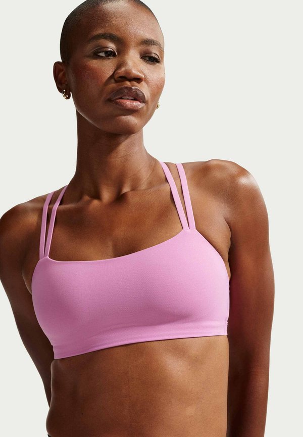 Nike Performance ZENVY STRAPPY BRA - Light support sports bra - lt magenta/white