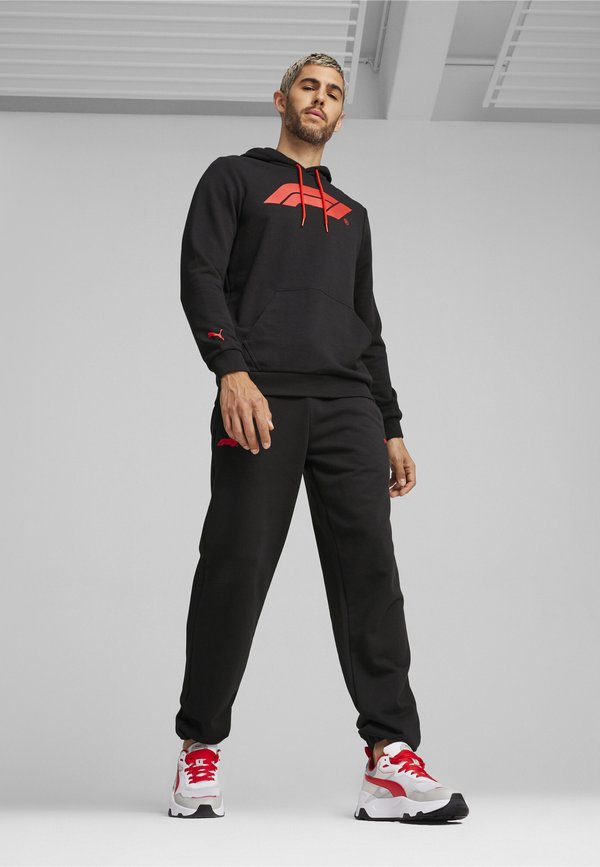 Puma MOTORSPORT  - Tracksuit bottoms - black