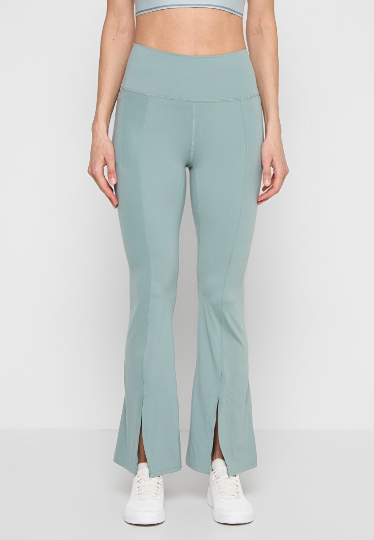 Under Armour MERIDIAN KICK FLARE PANT-GRN