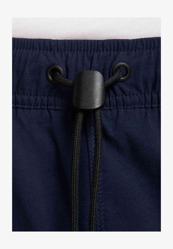 Nike Sportswear M NK TECH WVN SHORT - Tracksuit bottoms - obsidian black