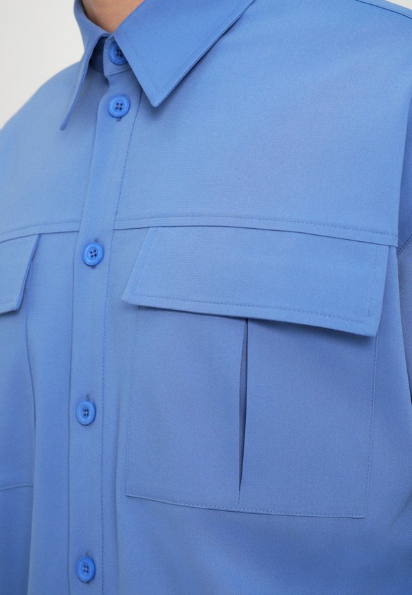Essential Collective DOUBLE POCKET SHIRT