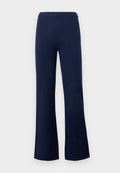 Marineblaue Strickhose mit elastischem Bund und weiten, leicht ausgestellten Beinen vor hellem, einfarbigem Hintergrund.