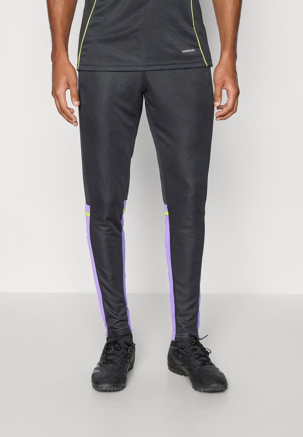adidas Performance SQUADRA REGULAR FIT - Tracksuit bottoms - black/purple rush