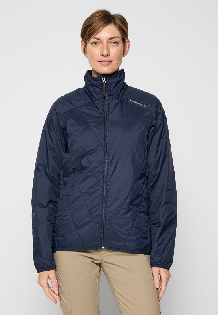 Navyblau, Reißverschlussjacke mit hohem Kragen, ausgestattet mit einem gesteppte Muster und leichtem Material, geeignet für Outdoor-Aktivitäten.