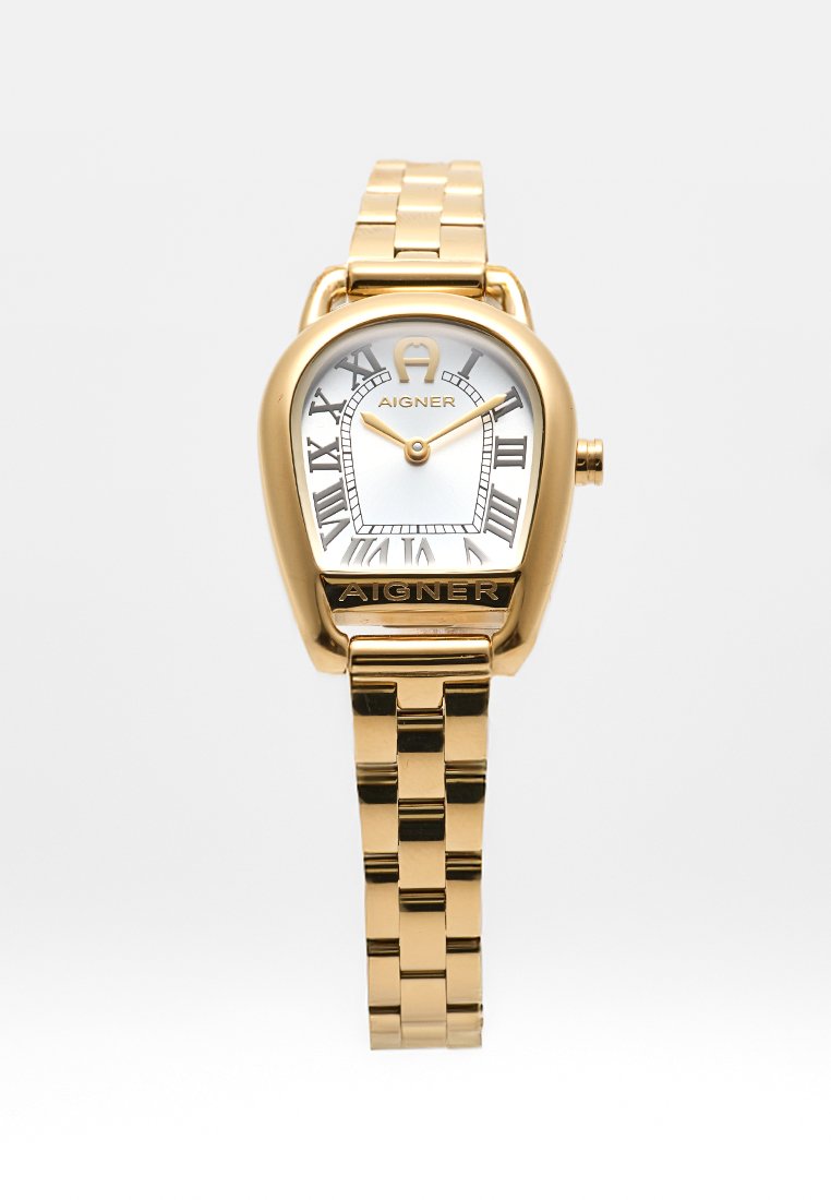 Goldene Aigner-Armbanduhr mit hufeisenförmigem Zifferblatt, weißem Zifferblatt, schwarzen römischen Ziffern und einem Gliederarmband aus Metall.