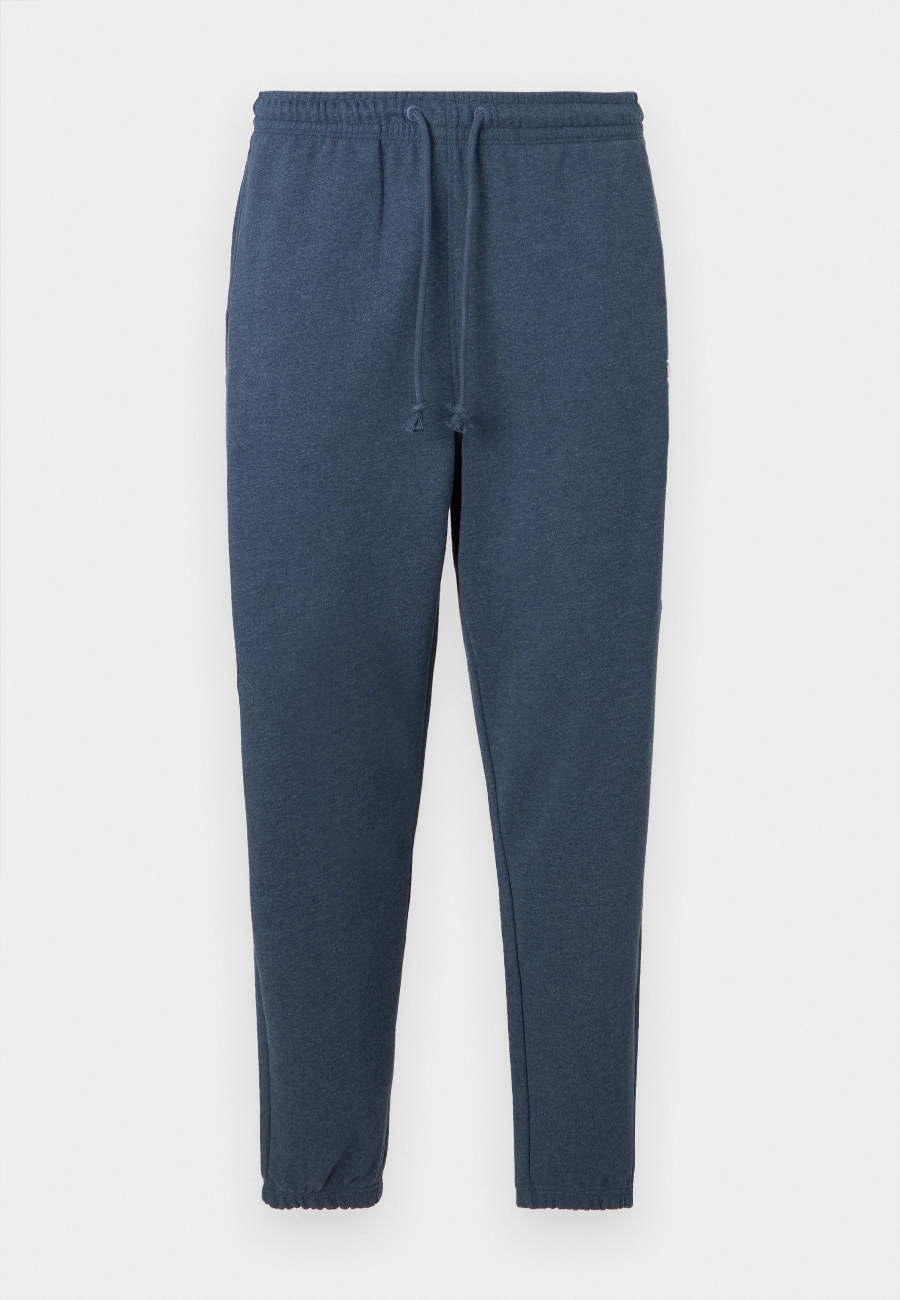 Marineblaue schmal geschnittene Jogginghosen mit elastischem Bund und Kordelzug, versehen mit elastischen Bündchen an den Knöcheln.