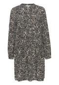 Schwarzes und cremefarbenes langärmliges Kleid mit Leopardenmuster, rundem Halsausschnitt und Knopfdetails an der Vorderseite. Weicher Stoff.