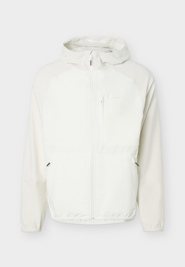 Nike Performance UNLIMITED UTILITY - Windbreaker - light orewood/sail