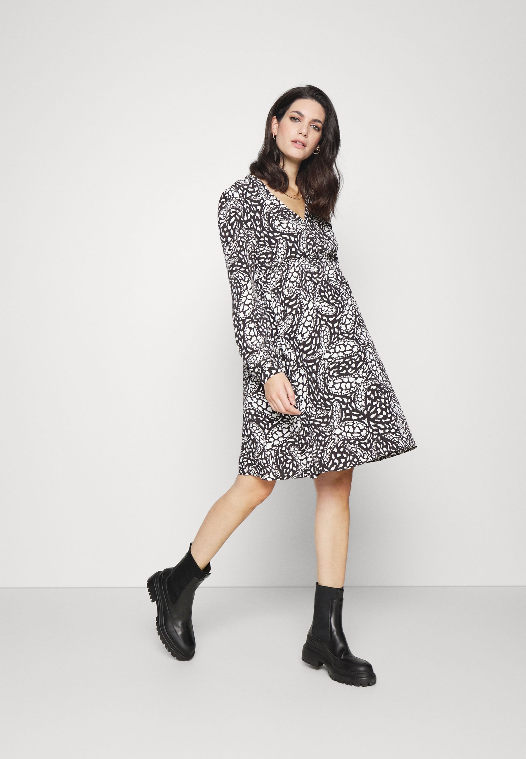 Glamorous Bloom DRESS WITH LOW VNECK LONG SLEEVES AND FRONT TIE DETAIL