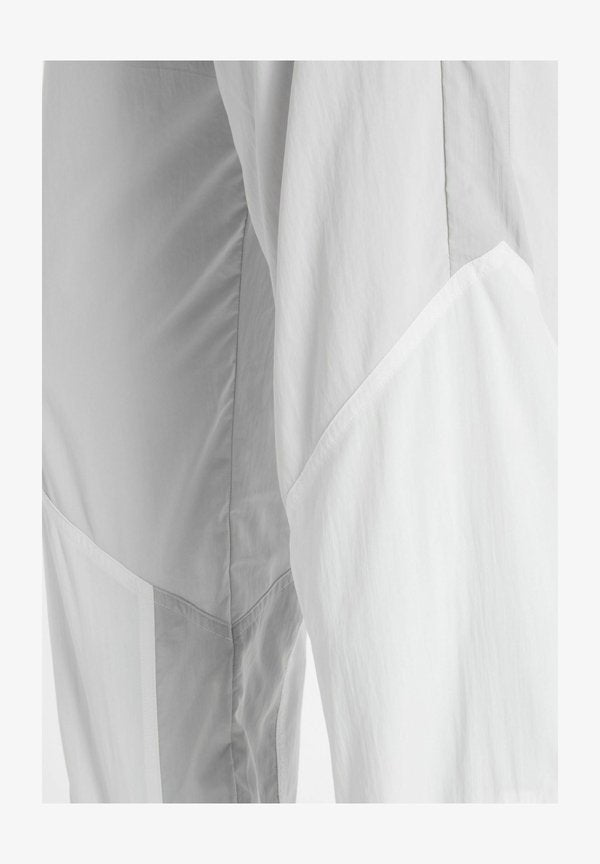 New Balance ACHIEVE PANT - Trousers - grey matter