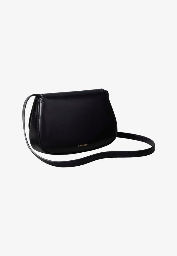 Calvin Klein FLAP CAMERA - Cross body bag - black