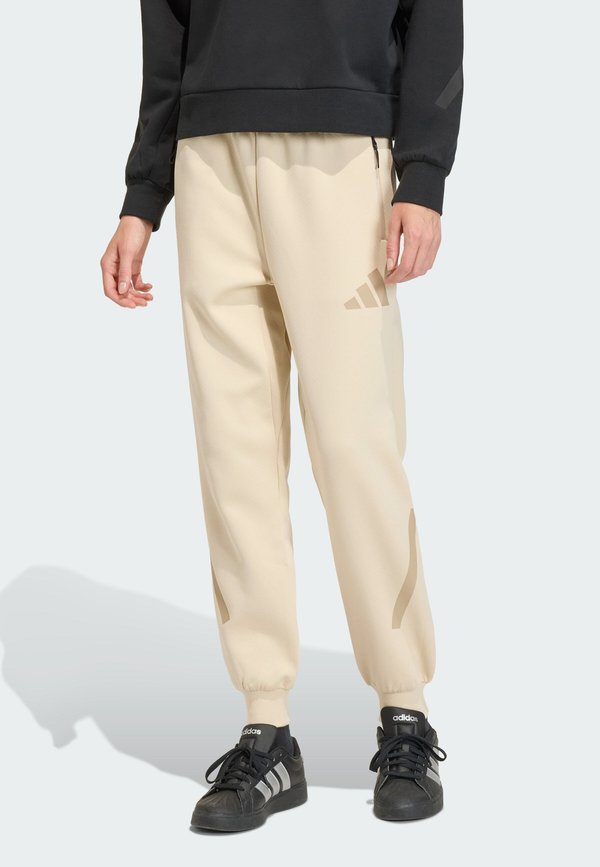 adidas Sportswear ADIDAS Z.N.E. - Tracksuit bottoms - beige
