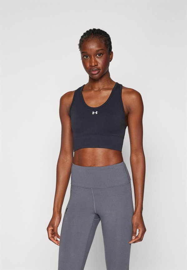 Under Armour VANISH SEAMLESS MID - Medium support sports bra - black/white