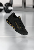 Nike Performance M NIKE REAX 8 TR MESH - Training shoe - black/metallic gold-coloured