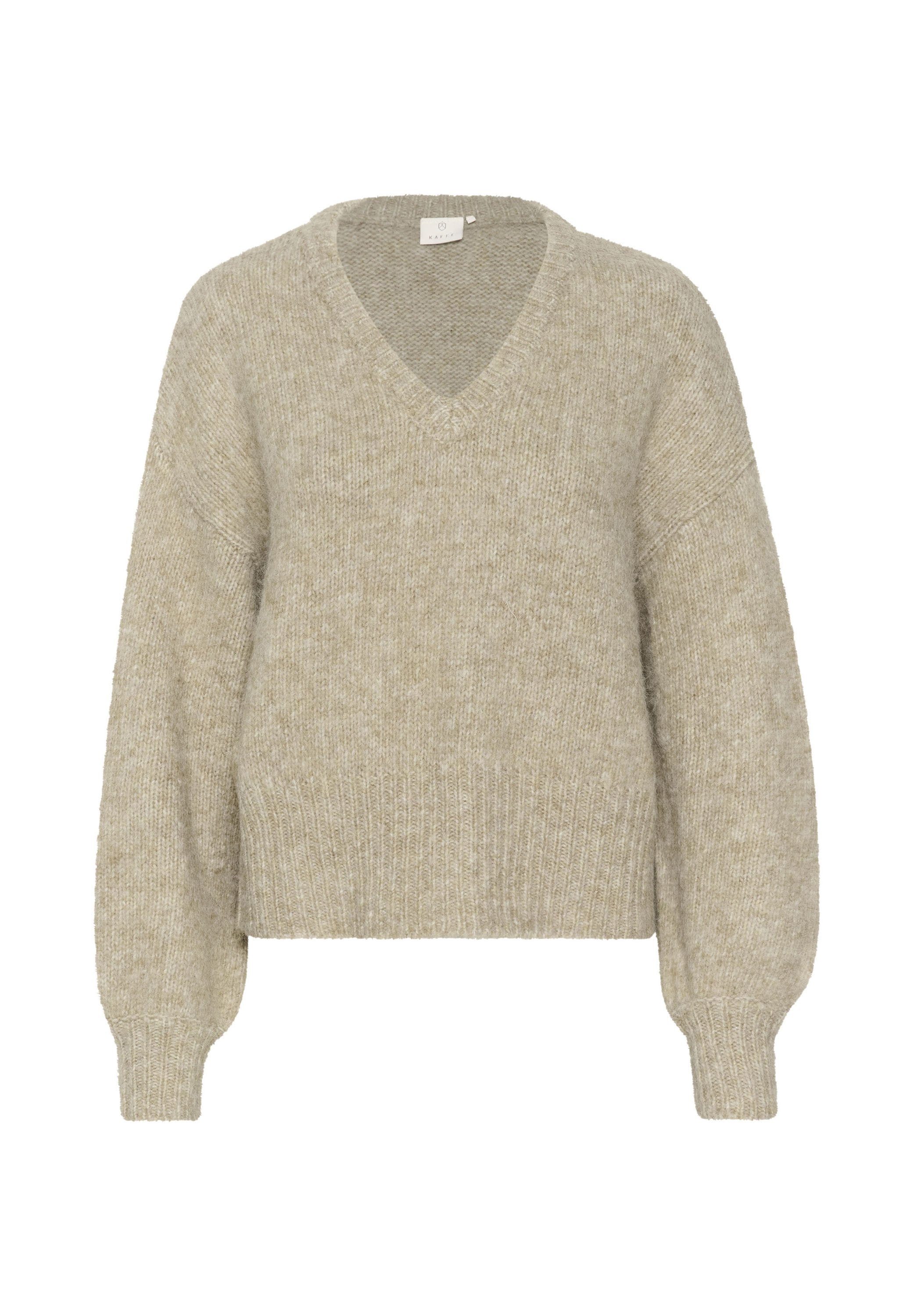 Beige V-Ausschnitt-Pullover aus weichem, strukturiertem Strickstoff. Mit langen Ärmeln und einem verkürzten Saum mit gerippten Bündchen sowie einem lässigen Schnitt.