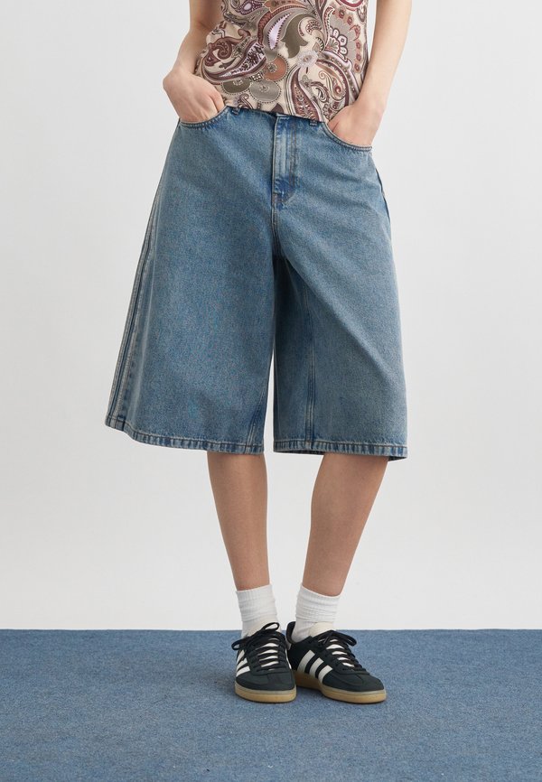 adidas Originals JORTS - Denim shorts - worn blue denim