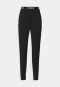Schwarze Hose mit einem elastischen Bund, der das Logo "HUGO" trägt. Das Design ist schlicht mit tapered Beinen und Bündchen. Weiches, dehnbares Material.