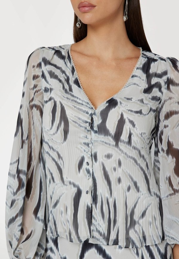 Guess ZEBRA