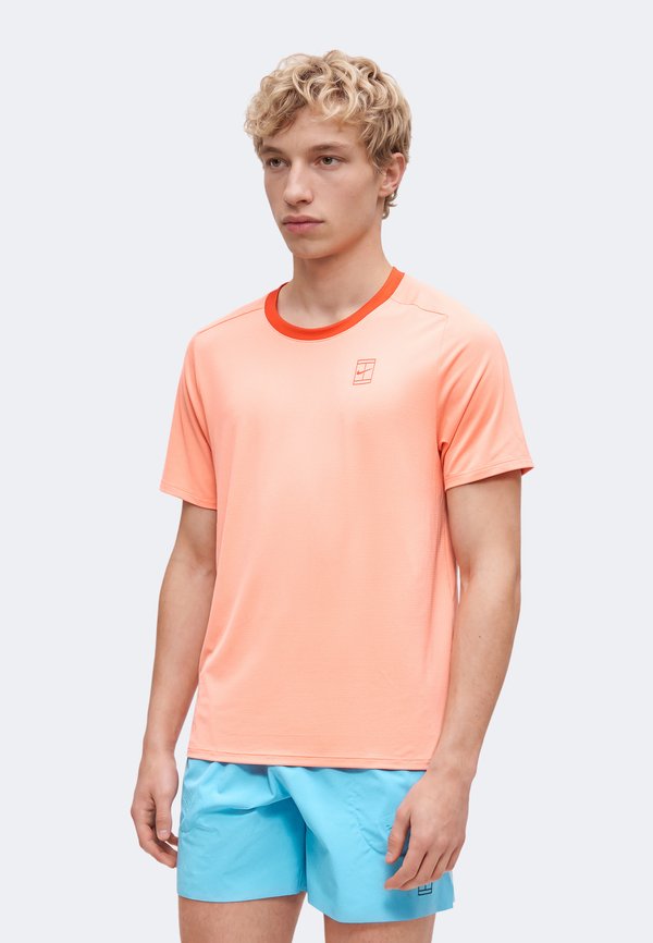 Nike Performance M NKCT DF ADVTG TOP - Sports T-shirt - atomic pink/picante red