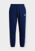 adidas Sportswear ESSENTIALS 3 STRIPES TAPERED CUFFED PANTS - Tracksuit bottoms - team navy blue 2/white