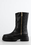 Schwarze Leder-Ankle-Boots mit glattem Vorderteil und gestepptem Muster an der Seite, ausgestattet mit einem goldenen Reißverschluss und einer massiven schwarzen Laufsohle.