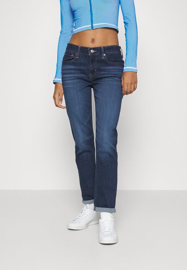 Levi's® MID RISE BOYFRIEND - Slim fit jeans - stone blue denim