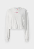 Weiße, kurze Sweatshirt-Jacke aus weichem Stoff, mit langen Ärmeln und einem roten Logo "tommy jeans" in der Mitte der Brust.