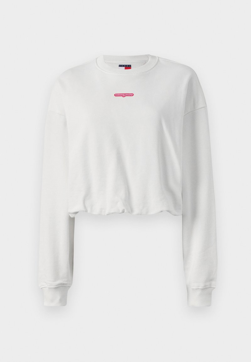 Weiße, kurze Sweatshirt-Jacke aus weichem Stoff, mit langen Ärmeln und einem roten Logo "tommy jeans" in der Mitte der Brust.