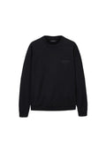 Schwarzer Sweatshirt aus Baumwolle, mit Rundhalsausschnitt, langen Ärmeln und einem dezenten Logo auf der Vorderseite. Gerippte Bündchen und Saum.