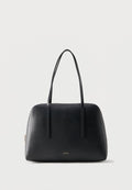 Calvin Klein FOIL LOGO BOWLING BAG - Tote bag - black/toasted coconut
