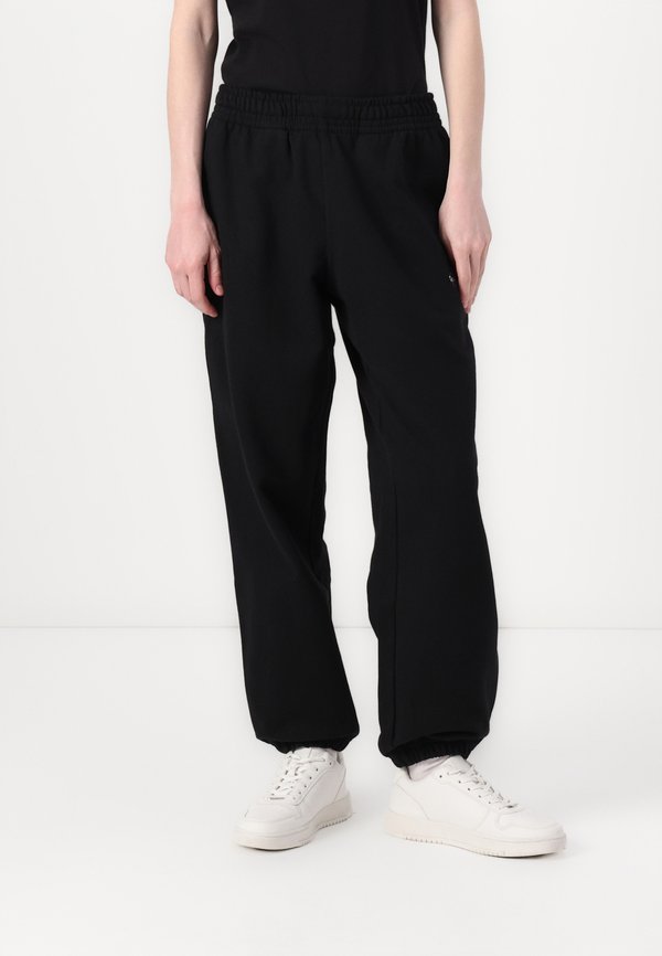 Calvin Klein Jeans MONOLOGO - Tracksuit bottoms - black