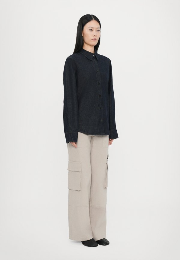 CLOSED SEAMING SHIRT