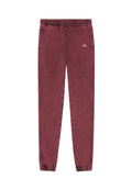 Bordeauxfarbene Acid-Wash-Jogginghosen mit elastischem Bund, seitlichen Taschen, gerippten Knöcheln und einem kleinen rot-weißen ovalen Logo am rechten Oberschenkel.
