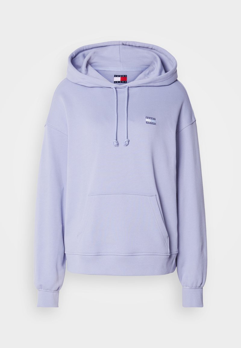 Hellblaue Kapuzenjacke aus weichem Material. Verfügt über eine Fronttasche, eine verstellbare Kapuze und ein kleines Logo-Patch auf der Brust. Rippbündchen.